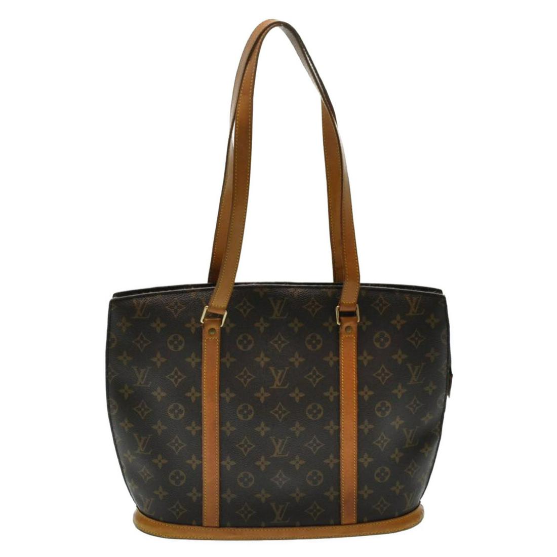 Authentic Louis Vuitton Monogram Babylone Tote: Brand: Louis Vuitton Style: Tote Bag Material: Monogram Canvas Color: Monogram Made In: France Size (Inches): W15.7 X H11.8 X D4.3"(Approx) Exterior Condition: Monogram Canvas : loose Shape, Rubbing L