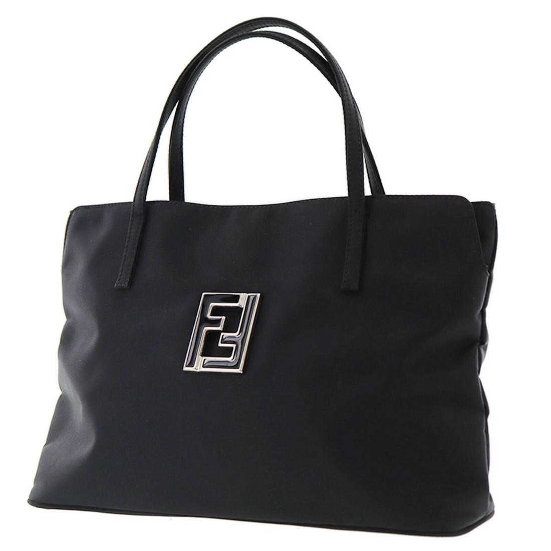 Authentic FENDI VINTAGE Nylon Toto Bag: Brand: FENDI Material: Nylon Style: Toto Bag Color: Black Size(Inch): H 8.0 x D 3.3 x L 11.8 Shoulder. 12.2 Country of Origin: Italy Come with: - All Bidhaus items come with a 100% money-back authenti