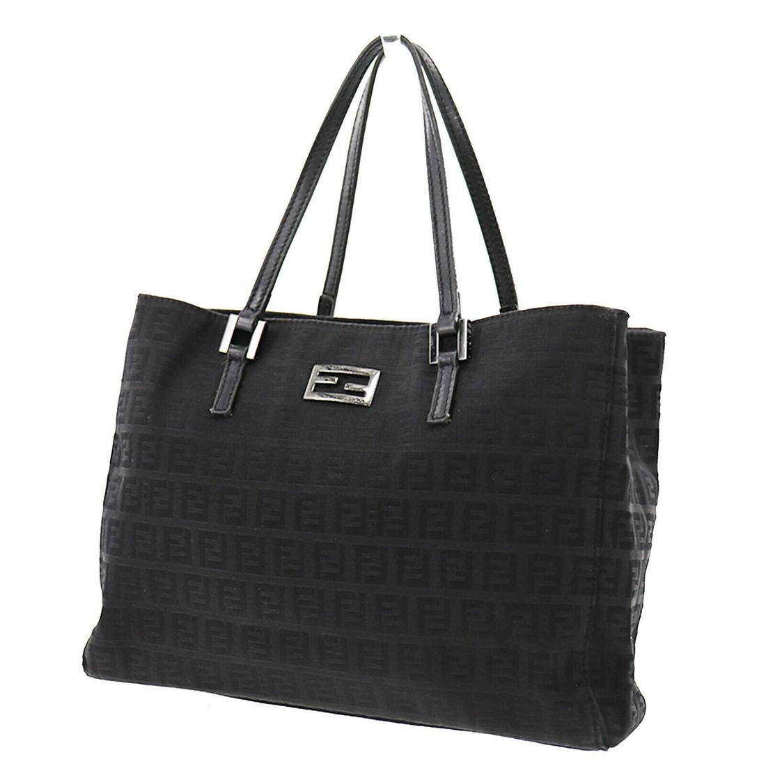 Authentic FENDI VINTAGE Canvas Tote: Brand: FENDI Material: Canvas Style: Tote Color: Black Size(Inch): H 7.8 x D 3.1 x L 10.6 Handle : 14.1 Country of Origin: Italy Come with: - All Bidhaus items come with a 100% money-back authenticity