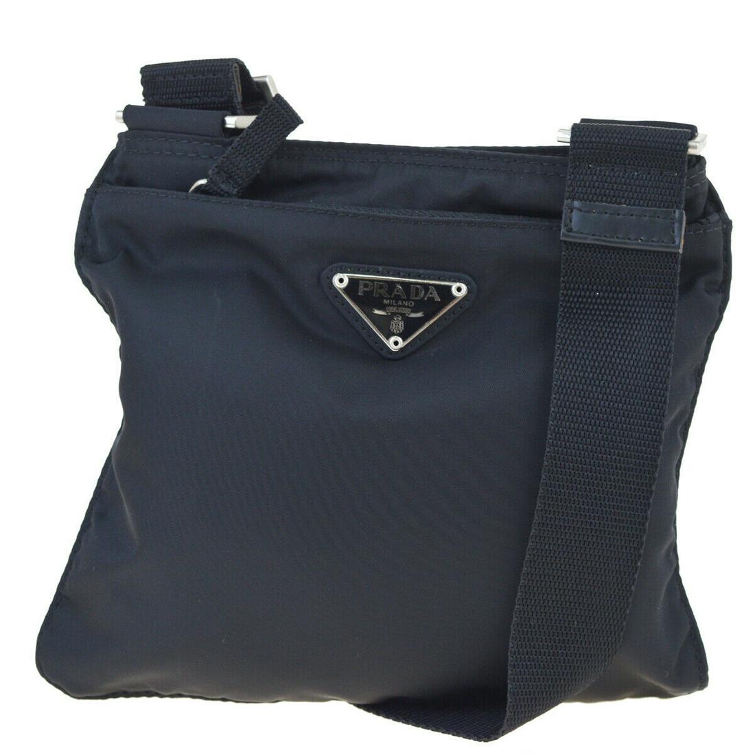 Authentic PRADA Leather Shoulder Bag: Brand: PRADA Material: Leather Style: Shoulder Bag Color: Black Size(inch): W 7.5 x H 7.5 x D 0.4 "(approx.) Country of Origin: Italy Come with: - All Bidhaus items come with a 100% money-back authent