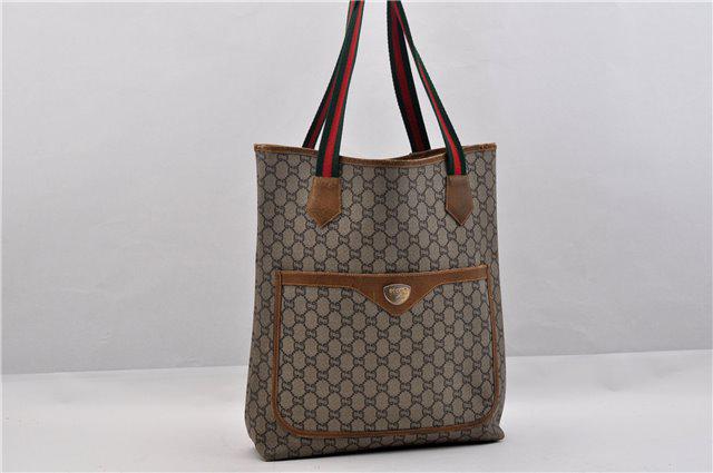 Authentic GUCCI PVC Tote Bag: Brand: GUCCI Material: PVC Style: Tote Bag Color: Brown Size(inch): W12.2 x H14.8 x D3.5"/ Strap Drop 9.8"(Approx) Country of Origin: Italy Accessory: There is no ItemBox and DustBag.We will send only