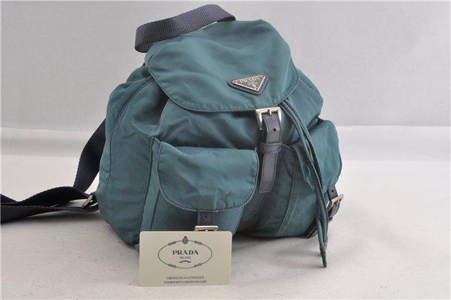 Authentic PRADA Nylon Backpack: Brand: PRADA Material: Nylon Style: Backpack Color: Light Blue Size(inch): W8.5 x H9.4 x D4.7" / Strap Drop 10.2-17.7"(Approx) Country of Origin: Italy Accessory: GuaranteeCard All Bidhaus items come