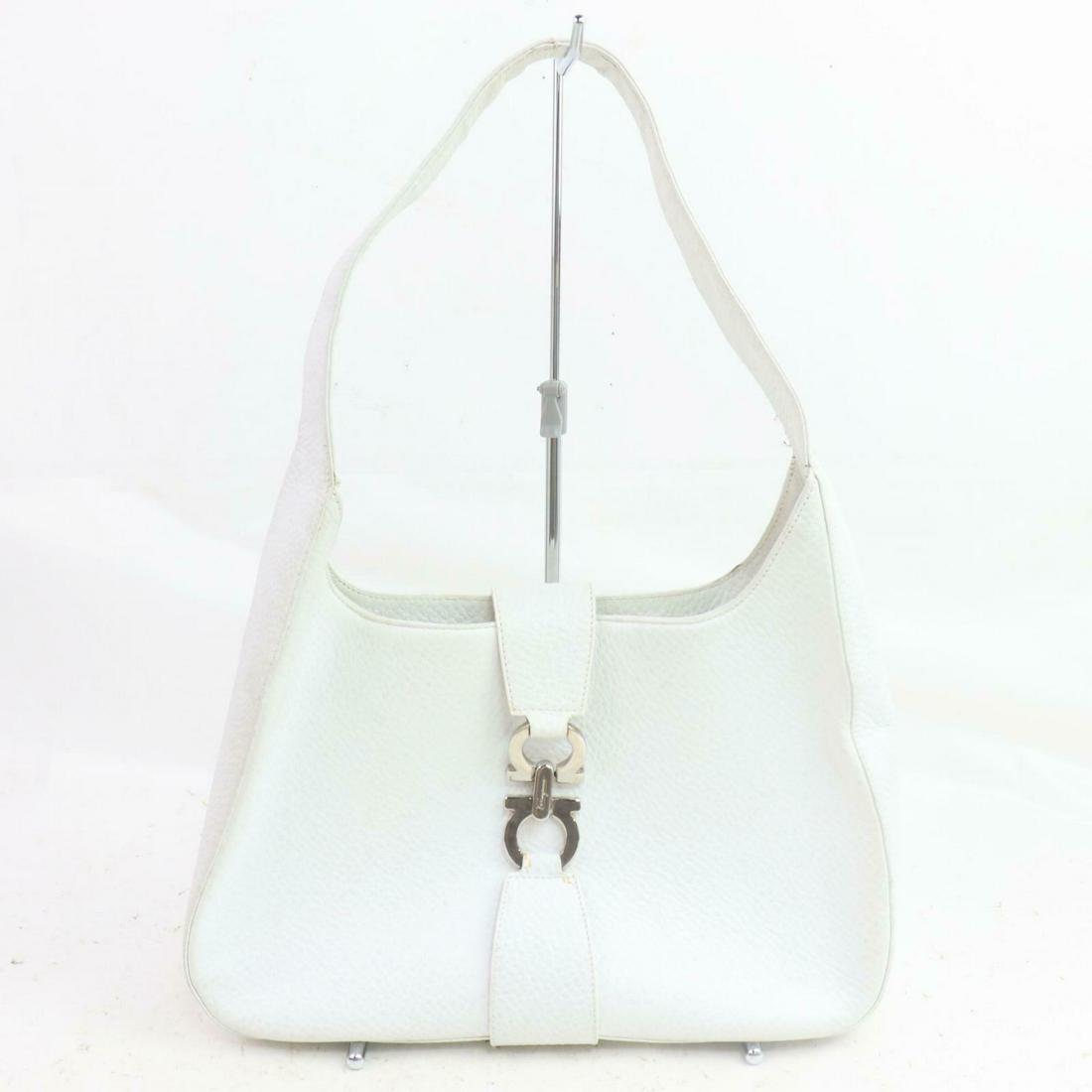 Authentic FERRAGAMO Leather Shoulder Bag: Brand: FERRAGAMO Material: Leather Style: Shoulder Bag Color: Whites Size(inch): W11.8 inch(approx) /30 cm(approx) x H9.44 inch(approx) /24 cm(approx) x D3.93 inch(approx) /10 cm(approx) " / Strap Dro