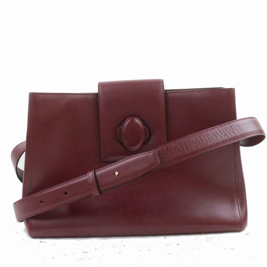 Authentic CARTIER Leather Shoulder Bag: Brand: CARTIER Material: Leather Style: Shoulder Bag Color: Bordeaux Size(inch): W11.4 inch(approx) /29 cm(approx) x H7.87 inch(approx) /20 cm(approx) x D4.72 inch(approx) /12 cm(approx) " / Strap Dro