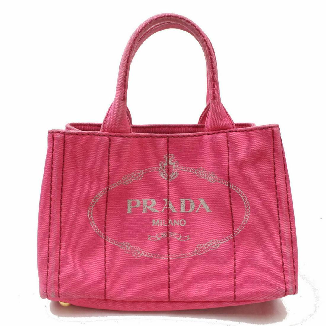 Authentic PRADA Canvas Hand Bag: Brand: PRADA Material: Canvas Style: Hand Bag Color: Pinks Size(inch): W11.0 inch(approx) /28 cm(approx) x H7.08 inch(approx) /18 cm(approx) x D5.51 inch(approx) /14 cm(approx) " Country of Origin: In