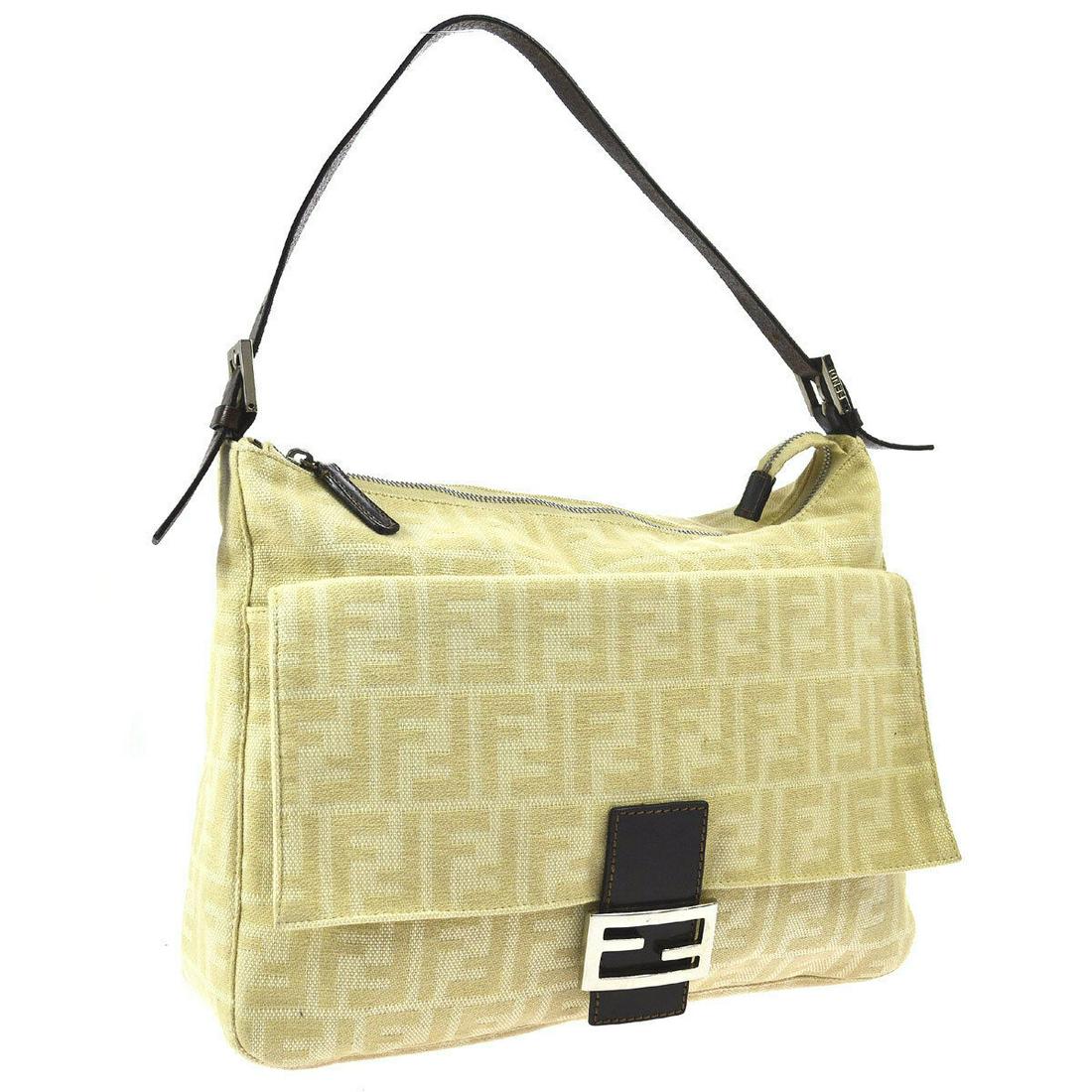 Authentic FENDI BAGUETTE Canvas, Leather Hand Bag: Brand: FENDI Material: Canvas, Leather Style: Hand Bag Color: Beige, Brown Size(inch): W13.0 x H11.0 x D3.9 " Size(inch): W 13.0 x H 11.0 x D 3.9 " Strap Drop. 5.5 - 7.9 " Country of Origin: Italy Com