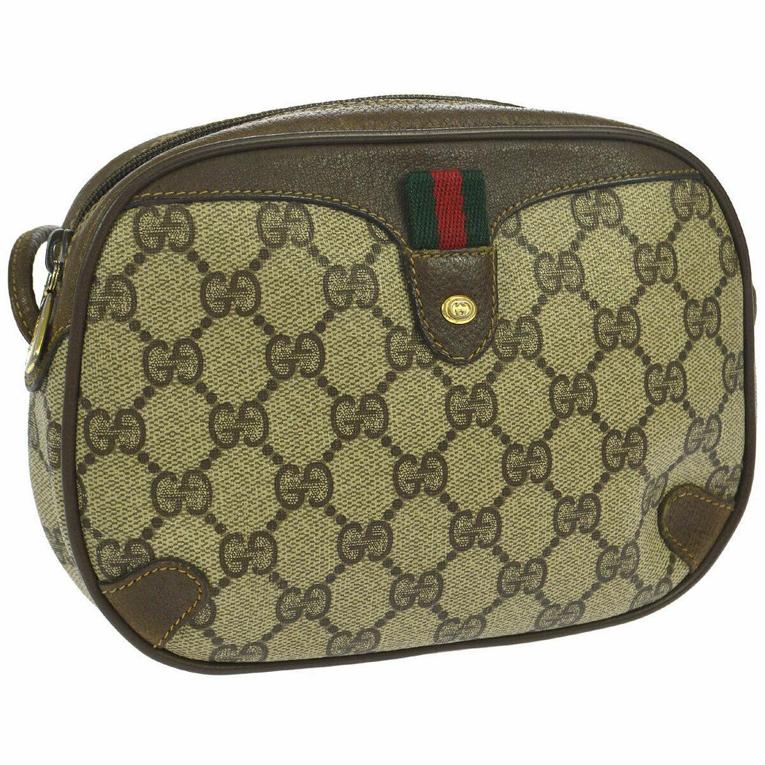 Authentic GUCCI PVC, Leather Messenger & Cross Body: Brand: GUCCI Material: PVC, Leather Style: Messenger & Cross Body Color: Brown, Red, Green Size(inch): W7.5 x H5.5 x D1.6 " / Strap Drop: 22.0 Size(inch): W 7.5 x H 5.5 x D 1.6 " Strap Drop. 22.0 " Co