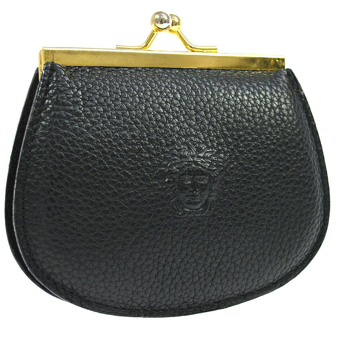 Authentic GIANNI VERSACE Leather Coin Purse: Brand: GIANNI VERSACE Material: Leather Style: Coin Purse Color: Black Country of Origin: Italy Come with: - All Bidhaus items come with a 100% money-back authenticity guarantee. Please refer to image
