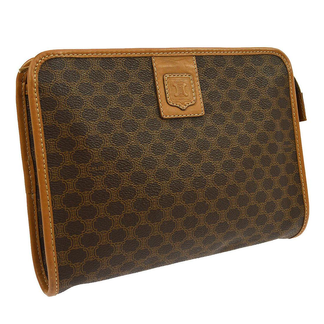 Authentic CELINE PVC, Leather Clutch: Brand: CELINE Material: PVC, Leather Style: Clutch Color: Brown Size(inch): W9.1 x H6.7 x D1.6 " Size(inch): W 9.1 x H 6.7 x D 1.6 " Country of Origin: Italy Come with: - All Bidhaus items come with a