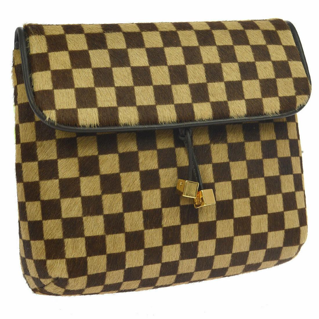 Authentic LOUIS VUITTON Fur, Leather Shoulder Bag: Brand: LOUIS VUITTON Material: Fur, Leather Style: Shoulder Bag Color: Brown Size(inch): W6.3 x H5.5 x D1.6 " / Strap Drop: 19.3 - 21.7 Size(inch): W 6.3 x H 5.5 x D 1.6 " Strap Drop. 19.3 - 21.7 " Co