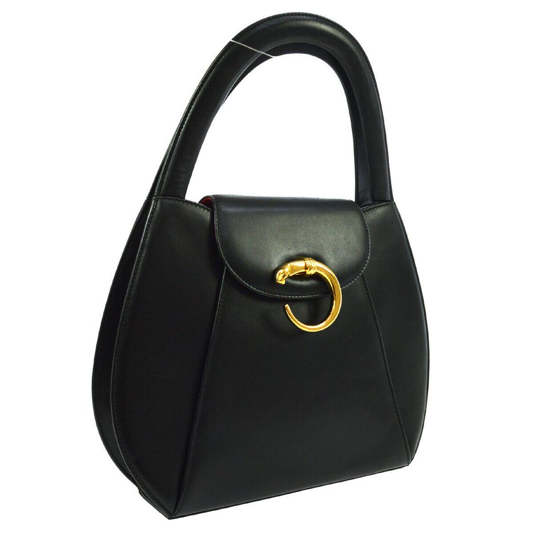 Authentic CARTIER Leather Handbag: Brand: CARTIER Material: Leather Style: Handbag Color: Black Size(inch): W8.7 x H9.1 x D2.8 " / Strap Drop: 4.3 Country of Manufacture: Italy Come with: Authenticity Card All Bidhaus items come with a
