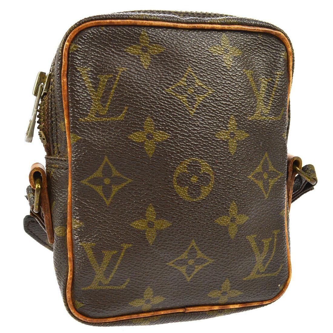 Authentic LOUIS VUITTON Monogram Canvas, Leather: Brand: LOUIS VUITTON Material: Monogram Canvas, Leather Style: Crossbody Color: Brown Size(inch): W4.3 x H5.5 x D1.6 " / Strap Drop: 19.3 - 22.4 Size(inch): W 4.3 x H 5.5 x D 1.6 " Strap Drop. 19.3 -