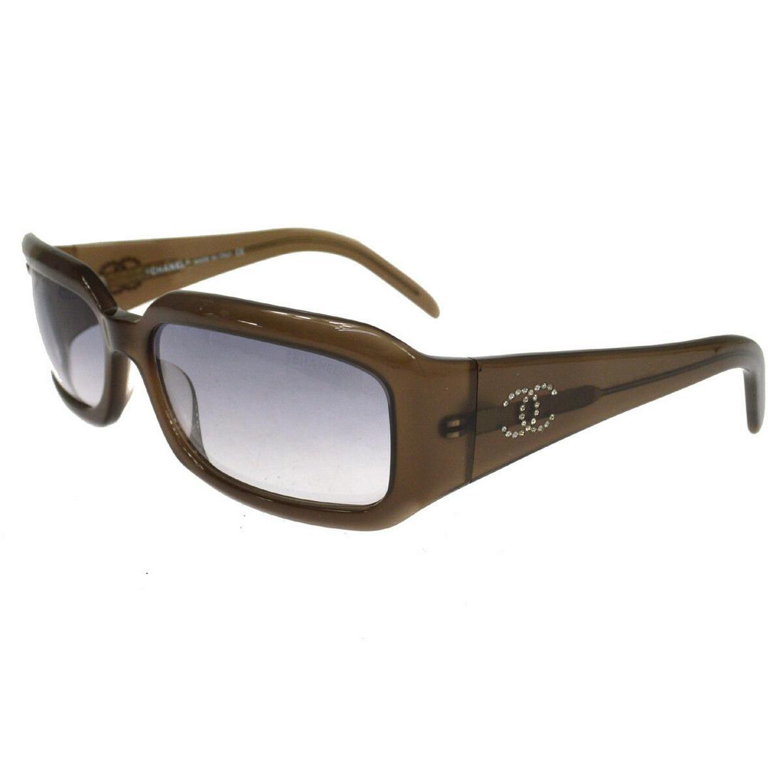 Authentic CHANEL Plastic Sunglasses: Brand: CHANEL Material: Plastic Style: Sunglasses Color: Brown Country of Manufacture: Italy Come with: Box, Case, Dust Bag All Bidhaus items come with a 100% money-back authenticity guarantee. Please