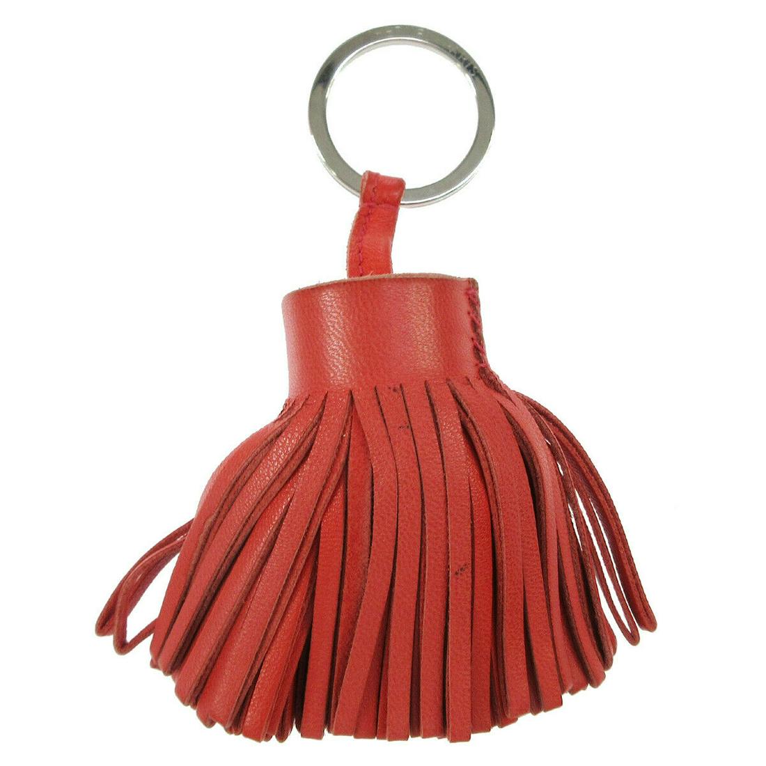 Authentic HERMES Carmencita Fringe Key Ring Holder: Brand: HERMES Material: Leather Color: Pink Country of Manufacture: France Come with: Box All Bidhaus items come with a 100% money-back authenticity guarantee. Please refer to images carefully for con