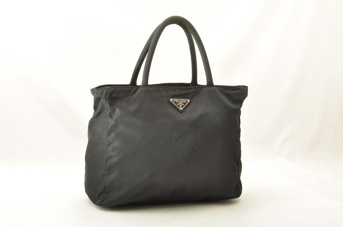 Authentic PRADA Nylon Hand Bag: Brand: PRADA Material: Nylon Style: Hand Bag Color: Black Size(inch): W11.81 x H9.84 x D3.93inch(Approx) Country of Origin: Italy Accessory: There is no item box and dust bag. We will send only the it