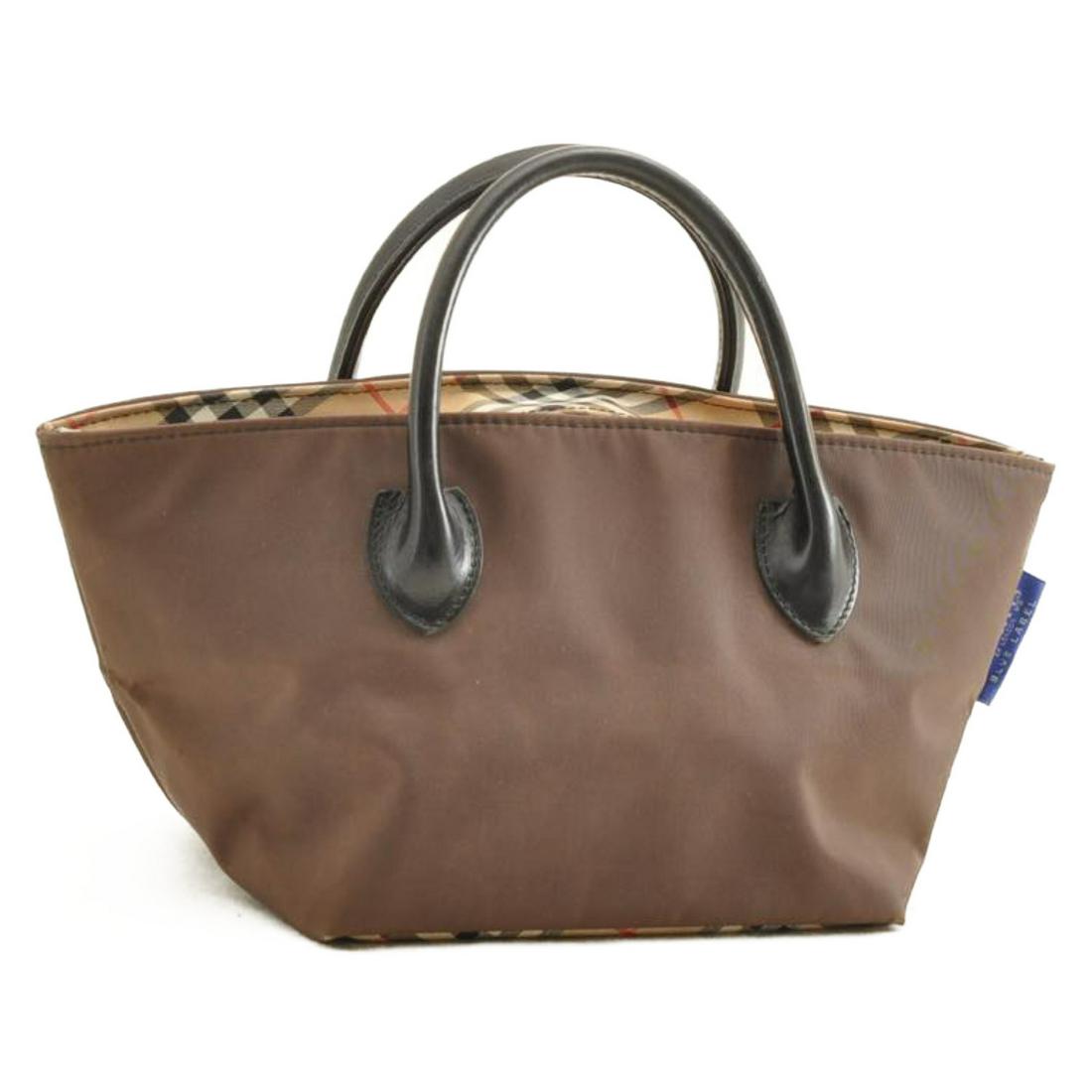 Authentic BURBERRY Nylon Hand Bag: Brand: BURBERRY Material: Nylon Style: Hand Bag Color: Beige / Brown Size(inch): W6.29 x H5.9 x D6.29inch(Approx) Country of Origin: Japan Accessory: There is no item box and dust bag. We will send on