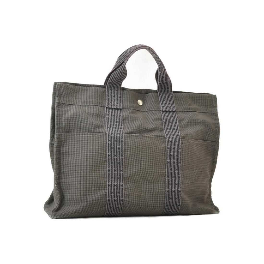 Authentic HERMES 69% Polyamide / 31% Polyester Tote Bag: Brand: HERMES Material: 69% polyamide / 31% Polyester Style: Tote Bag Color: Gray Size(inch): W16.5 x H11.8 x D3.9â€³(Approx) Country of Origin: France Accessory: Padlock(107)(No keys) All Bidhaus