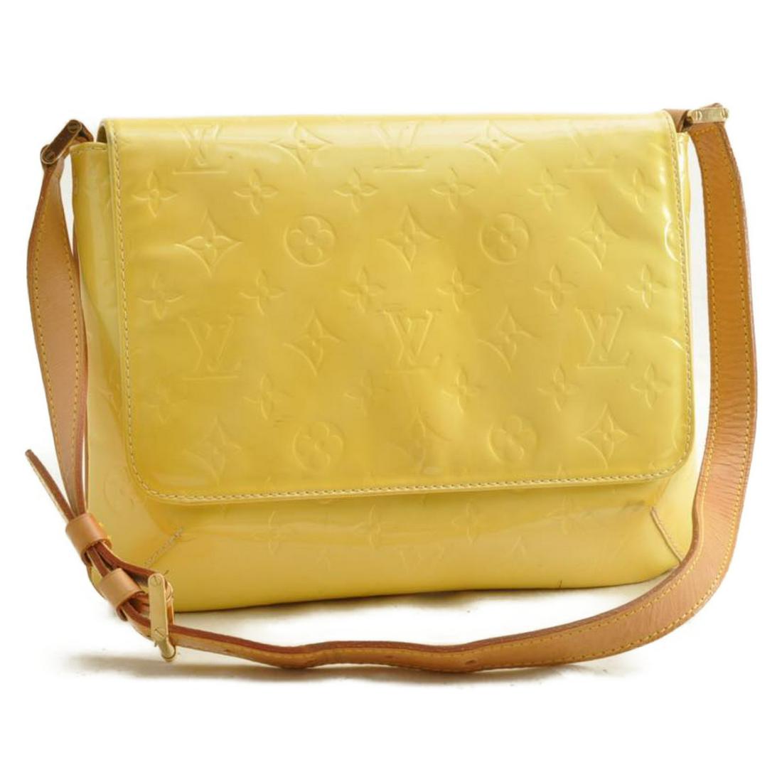 Authentic LOUIS VUITTON VERNIS THOMPSON STREET Patent: Brand: LOUIS VUITTON Material: Patent Leather Style: Shoulder Bag Color: LimeYellow Size(inch): W10.2 x H7.9 x D2.0â€³ / Shoulder Strap Drop 9.4-11.8cm(Approx) Country of Origin: Spain Accessory: 