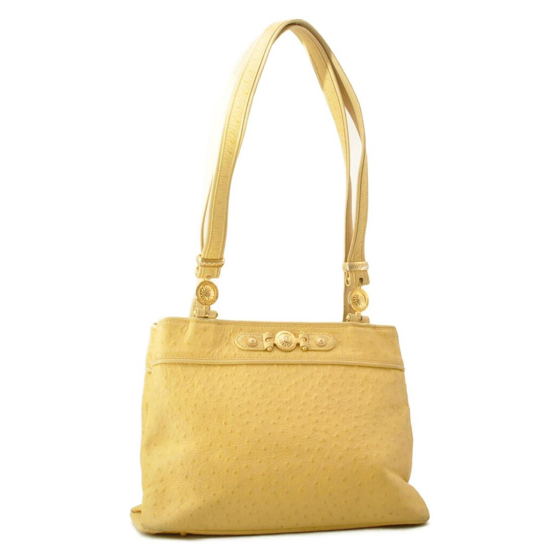 Authentic GIANNI VERSACE Leather Shoulder Bag: Brand: GIANNI VERSACE Material: Leather Style: Shoulder Bag Color: Yellow Size(inch): W12.99 x H9.44 x D4.72inch(Approx) Country of Origin: â€“ Accessory: There is no item box and dust bag. We wi