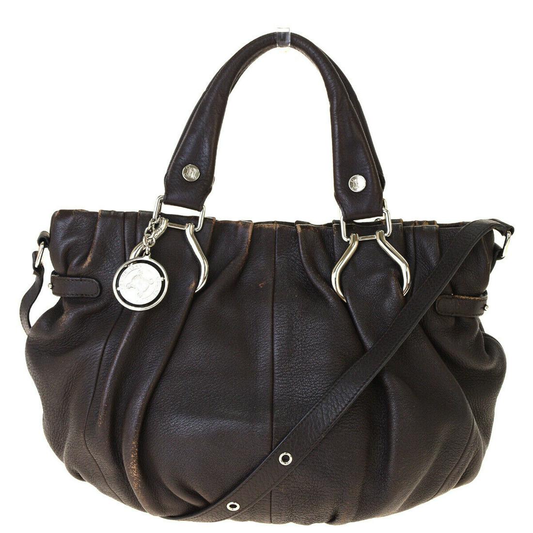 Authentic CELINE Leather Handbag: Brand: CELINE Material: Leather Style: Handbag Color: Brown Size (HxWxD): 23cm x 33cm x 12cm / 9.05'' x 12.99'' x 4.72'' Country of Origin: Unknown All Bidhaus items come with a 100% money-back authen