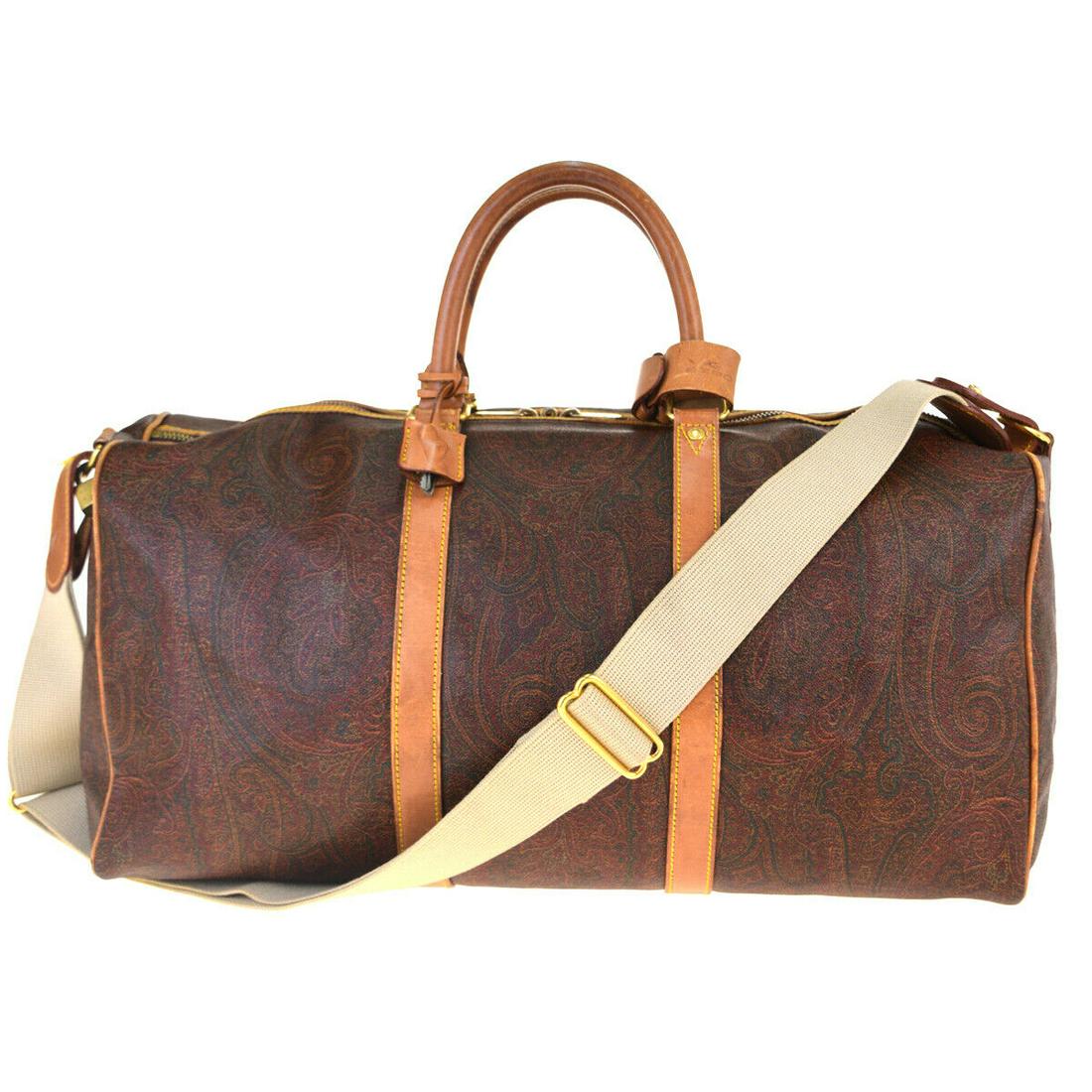 Authentic ETRO PVC Leather Hand bag: Brand: ETRO Material: PVC Leather Style: Hand bag Color: Bordeaux, Size(inch): W 19.7 x H 9.4 x D 9.4 "(approx.) Country of Origin: Italy Come with: Key*2,,Keybell,Handle holder All Bidhaus items come