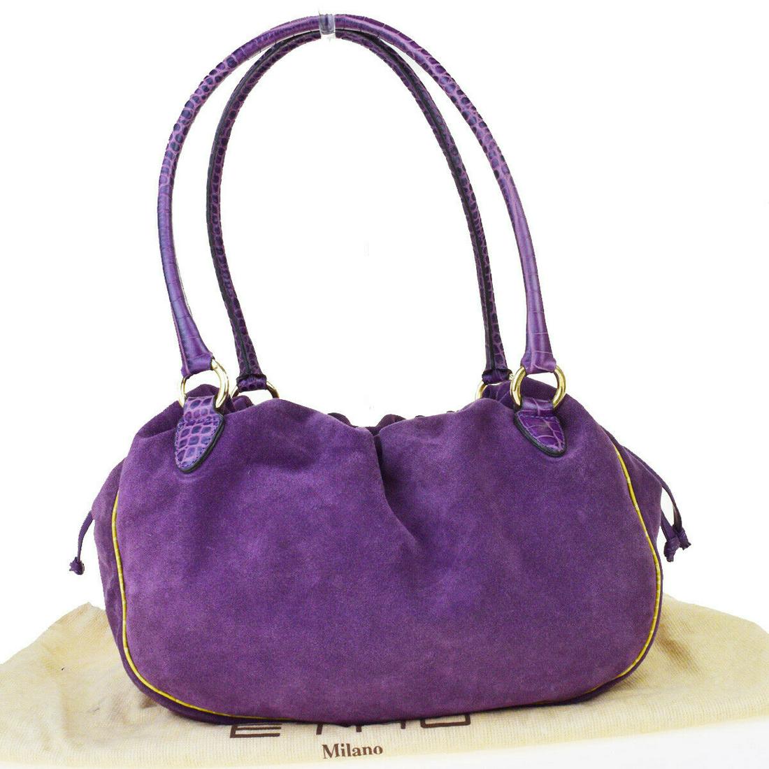 Authentic ETRO Suede Skin leather Shoulder Bag: Brand: ETRO Material: Suede Skin leather Style: Shoulder Bag Color: Purple Size(inch): W 13 x H 9.1 x D 3.5 "(approx.) Country of Origin: Italy Come with: Dust bag All Bidhaus items come with a 100% m