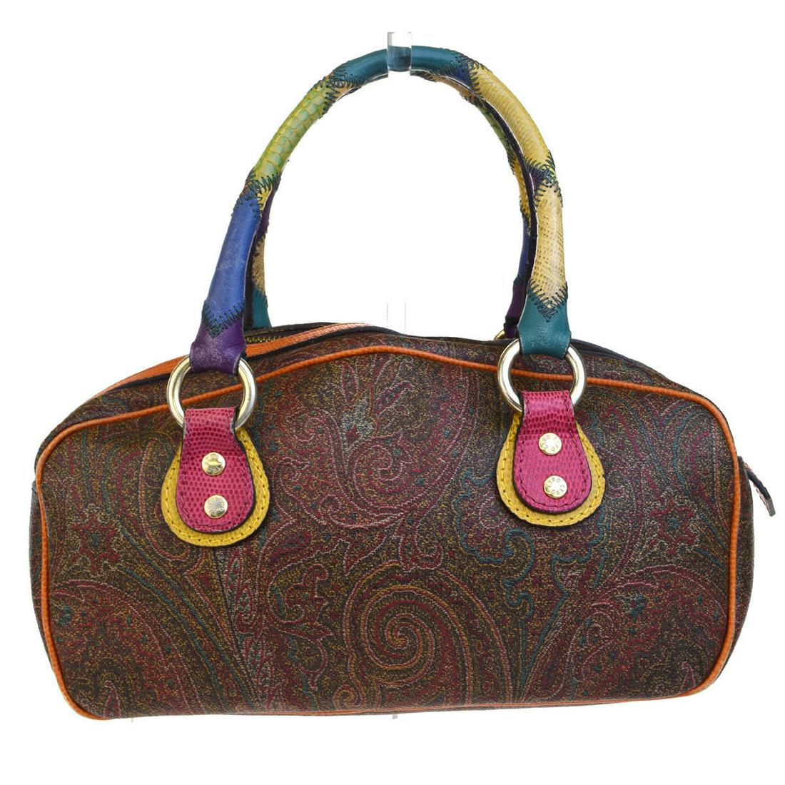 Authentic ETRO PVC,Lizard Skin Leather Hand Bag: Brand: ETRO Material: PVC,Lizard Skin Leather Style: Hand Bag Color: Bordeaux,Multi-Color Size(inch): W 10.6 x H 6.3 x D 4.3 "(approx.) Country of Origin: Italy Come with: - All Bidhaus items come wit