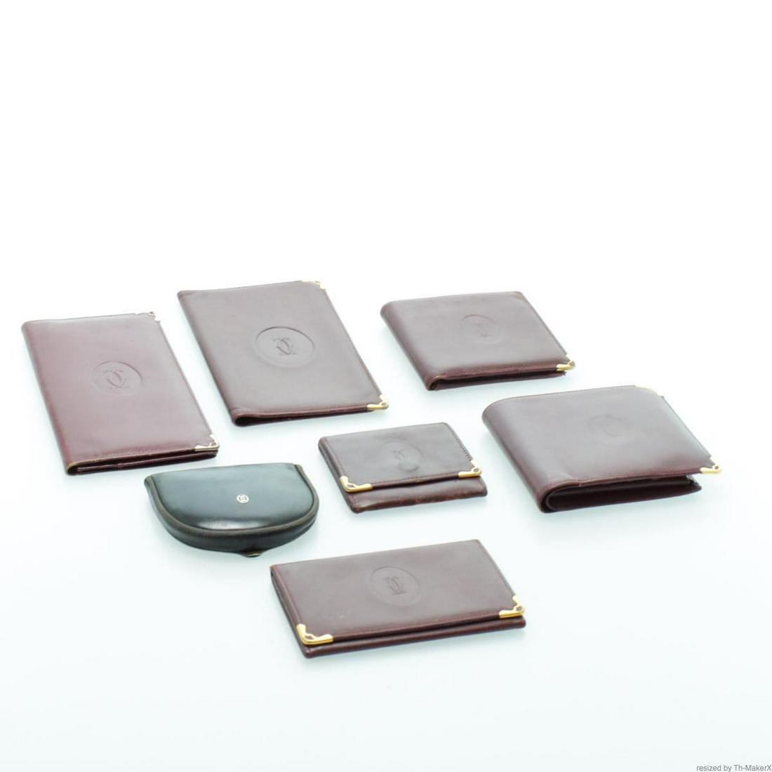 Authentic Cartier Must Line Wallet Coin Case Card Case: Brand: Cartier Style: Wallet / Coin Case / Card Case Material: Leather Color: Bordeaux / Black Made In: - Size (Inches): - Exterior Condition: Leather : Rubbing, Scratches, minor loose Shape, Crack Me