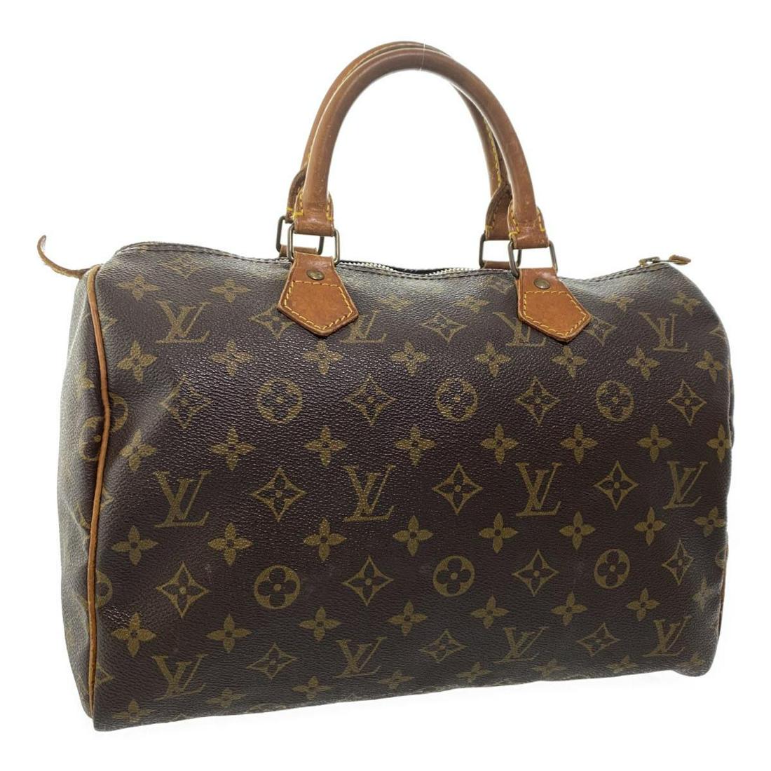 Authentic Louis Vuitton Monogram Speedy 30 Hand Bag: Brand: Louis Vuitton Style: Hand Bag Material: Monogram Canvas Color: Monogram Made In: France Size (Inches): W12 X H9 X D6.5"(Approx) Exterior Condition: Monogram Canvas : Rubbing, minor loose Shape