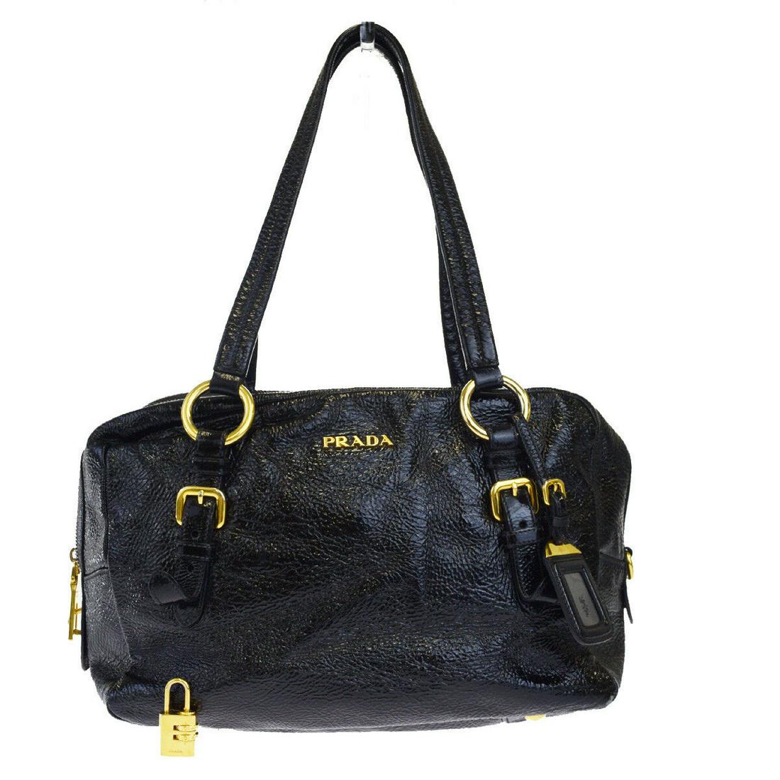 Authentic PRADA Coating Canvas Shoulder Bag: Brand: PRADA Material: Coating Canvas Style: Shoulder Bag Color: Black Size(inch): W 11.8 x H 7.9 x D 5.9"(approx.) Country of Origin: Italy Come with: - All Bidhaus items come with a 100% money-back 