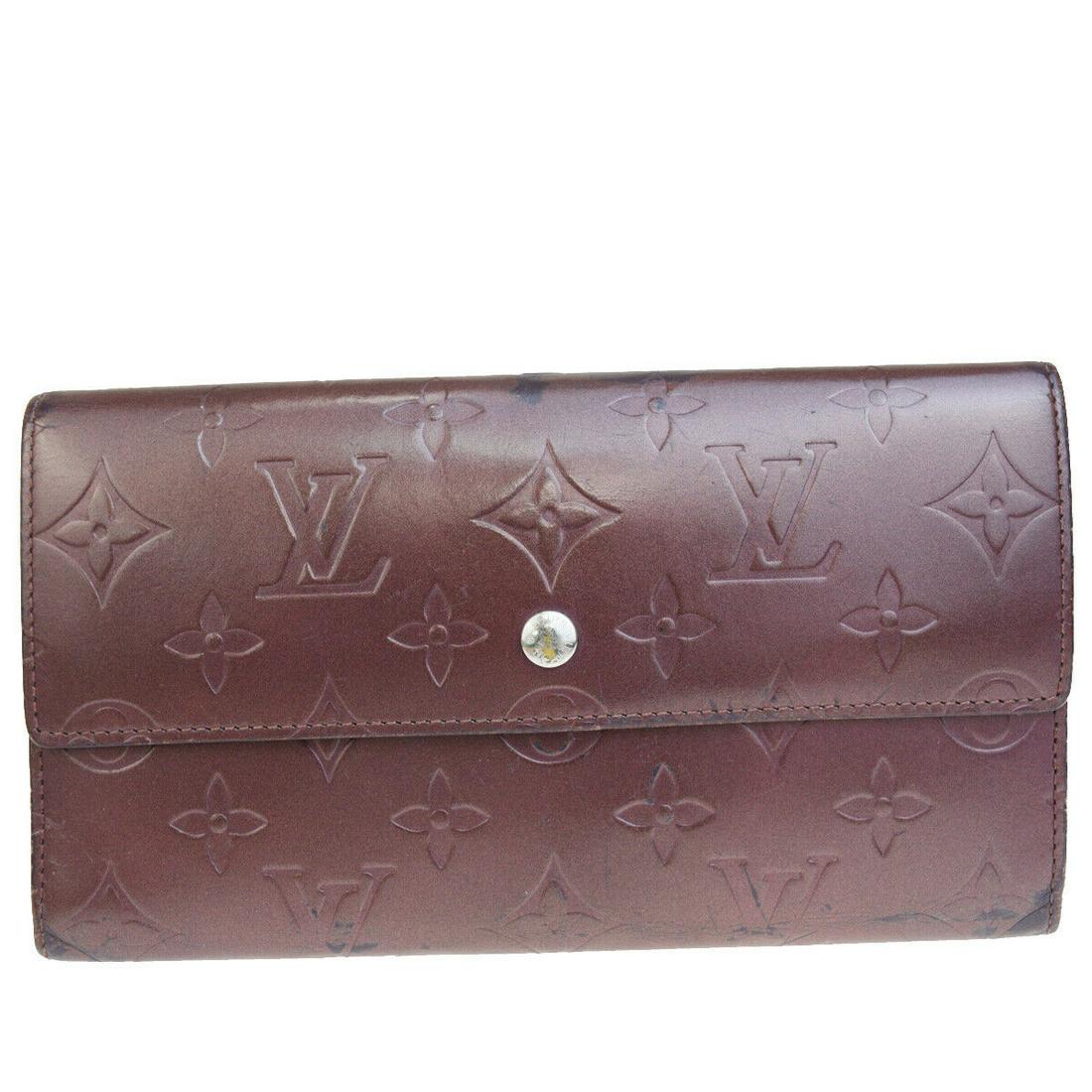Authentic LOUIS VUITTON Monogram Mat Leather Wallet: Brand: LOUIS VUITTON Material: Monogram Mat Leather Style: Wallet Color: Bordeaux Size(inch): W 7.5 x H 4.3 x D 0 "(approx.) Country of Origin: France Come with: - All Bidhaus items come with a 100% m