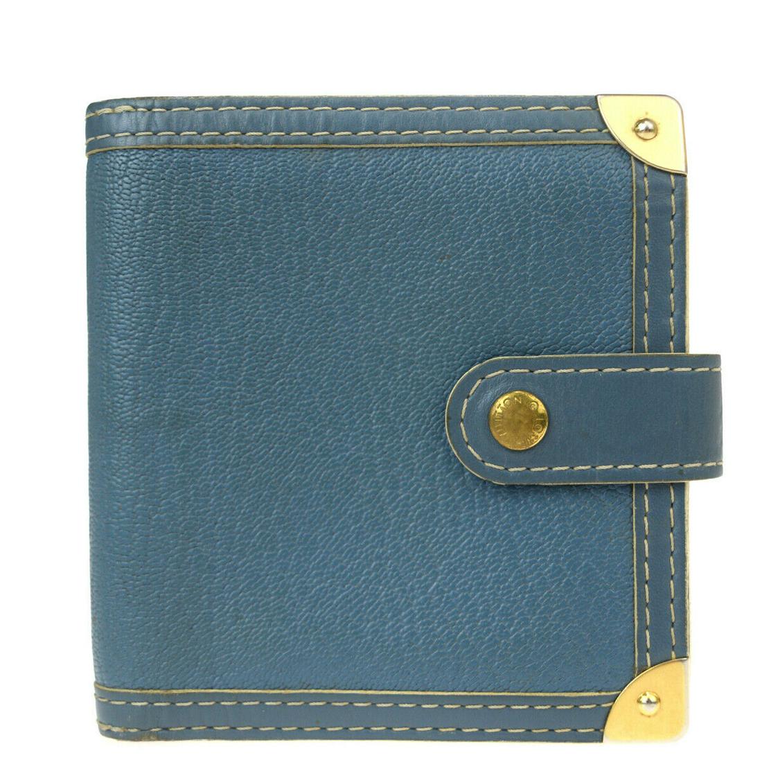 Authentic LOUIS VUITTON Suhali Leather Wallet: Brand: LOUIS VUITTON Material: Suhali Leather Style: Wallet Color: Blue Size(inch): W 4.3 x H 3.9 x D 0 "(approx.) Country of Origin: France Come with: - All Bidhaus items come with a 100% money-back