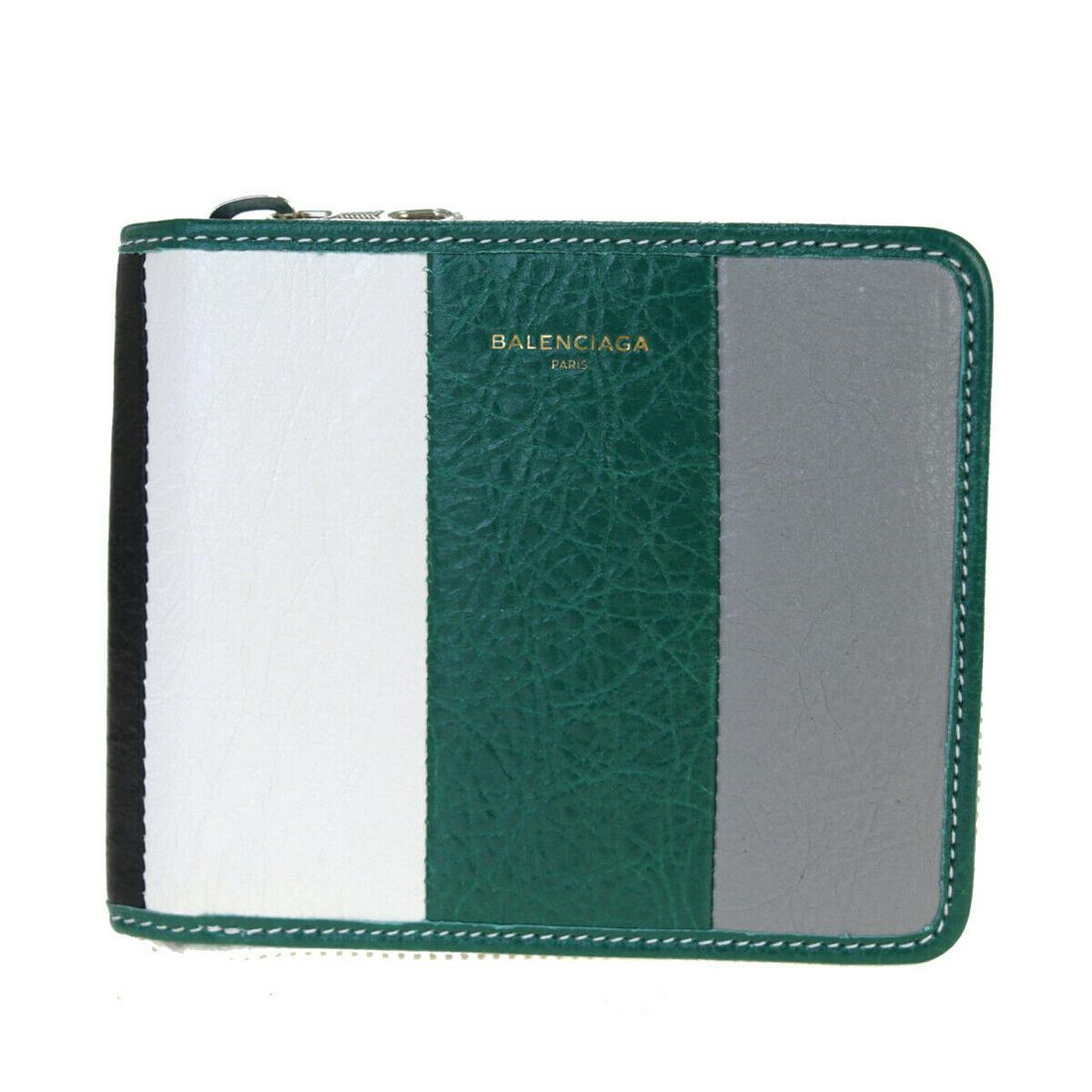 Authentic BALENCIAGA Leather Wallet: Brand: BALENCIAGA Material: Leather Style: Wallet Color: Green Size(inch): W 4.7 x H 3.7 x D 0.6 "(approx.) Country of Origin: Italy Come with: - All Bidhaus items come with a 100% money-back authenti