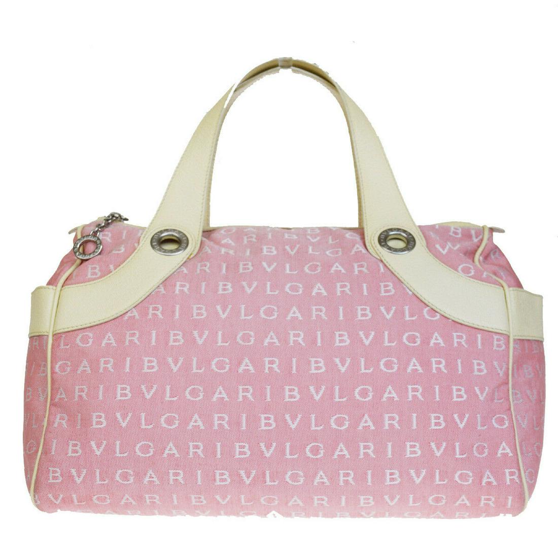 Authentic BVLGARI Canvas Leather Hand bag: Brand: BVLGARI Material: Canvas Leather Style: Hand bag Color: Pink Size(inch): W 11.8 x H 8.3 x D 5.9 "(approx.) Country of Origin: Italy Come with: - All Bidhaus items come with a 100% money-back au