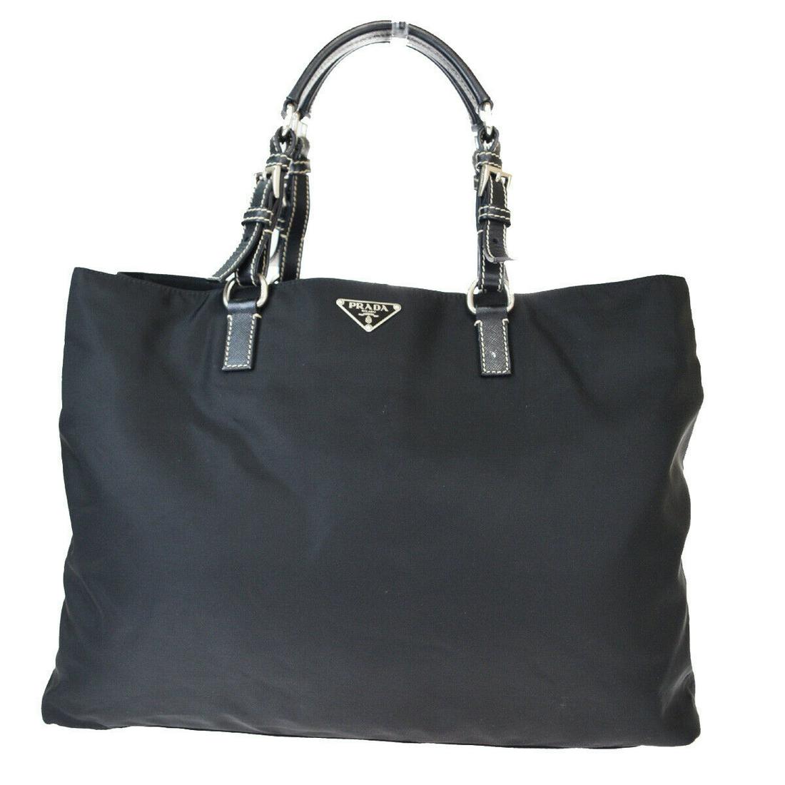 Authentic PRADA Leather, Nylon Shoulder Bag: Brand: PRADA Material: Leather, Nylon Style: Shoulder Bag Color: Black Size(inch): W 15 x H 11 x D 4.3 "(approx.) Country of Origin: Italy Come with: - All Bidhaus items come with a 100% money-back au