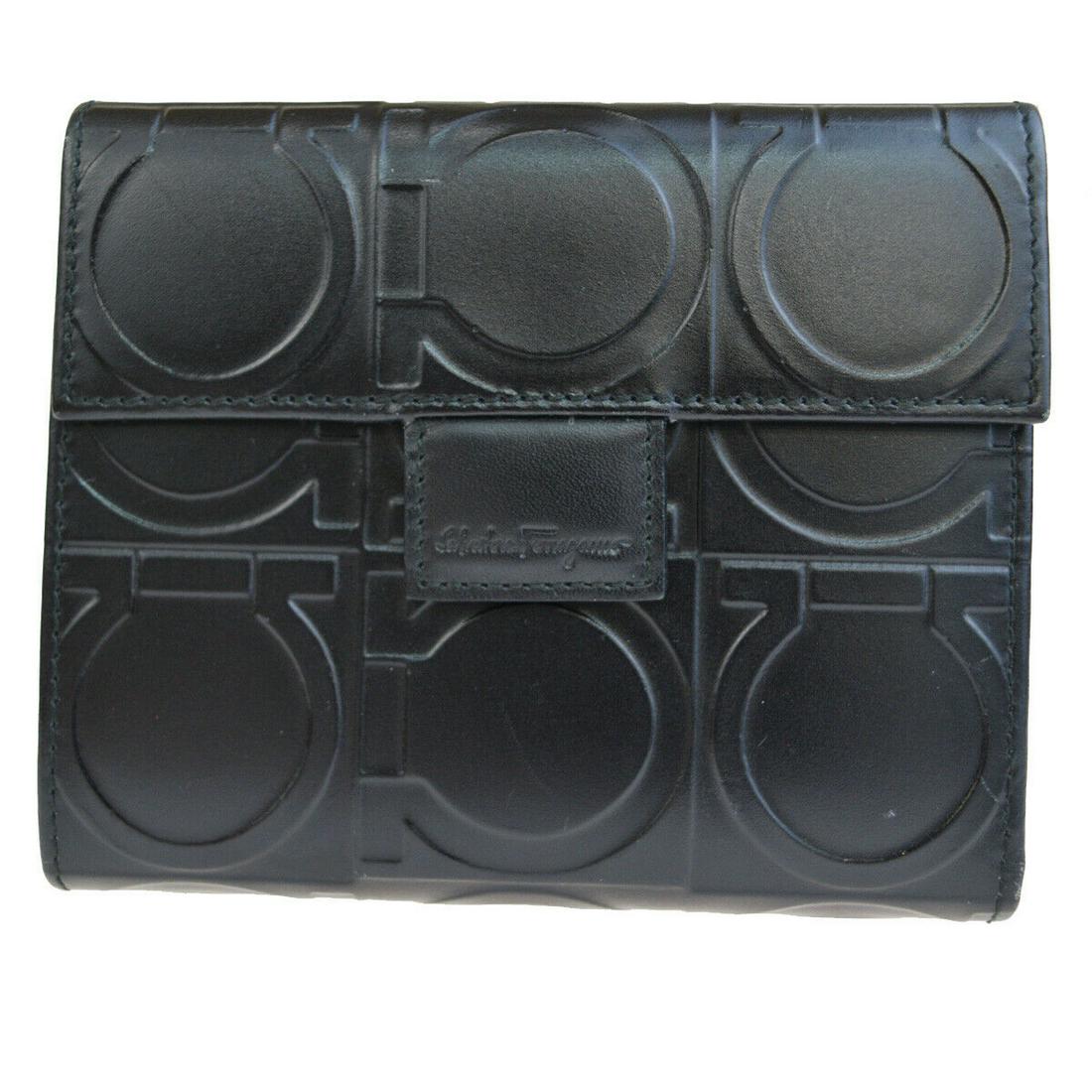 Authentic SALVATORE FERRAGAMO Leather Wallet: Brand: SALVATORE FERRAGAMO Material: Leather Style: Wallet Color: Black Size(inch): W 4.7 x H 3.9 x D 0"(approx.) Country of Origin: Italy Come with: - All Bidhaus items come with a 100% money-back au