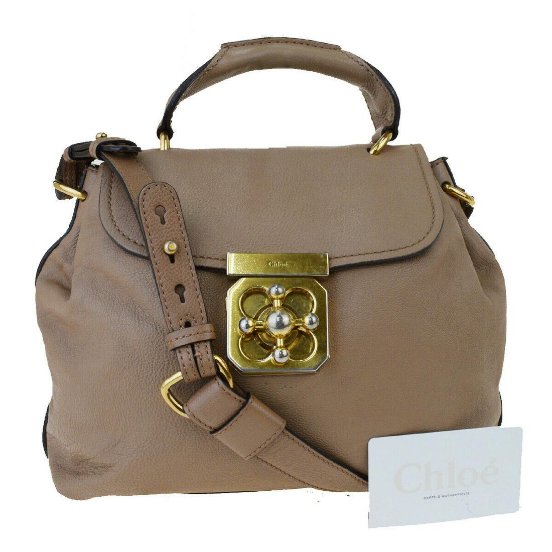 Authentic CHLOE Leather Hand bag: Brand: CHLOE Material: Leather Style: Hand bag Color: Gray Size(inch): W 10.6 x H 8.7 x D 3.1 "(approx.) Country of Origin: Hungary Come with: Authenticity Card All Bidhaus items come with a 100% mone