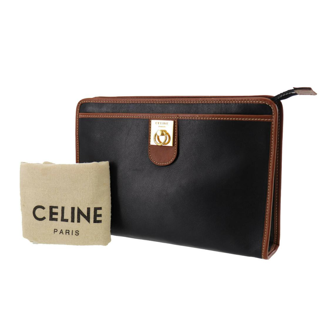 Authentic CELINE Leather Clutch Bag: Brand: CELINE Material: Leather Style: Clutch Bag Color: Brown Size(Inch): H 7.0 x D 2.1 x L 10.4 Country of Origin: Italy Come with: Dust Bag All Bidhaus items come with a 100% money-back authenticit