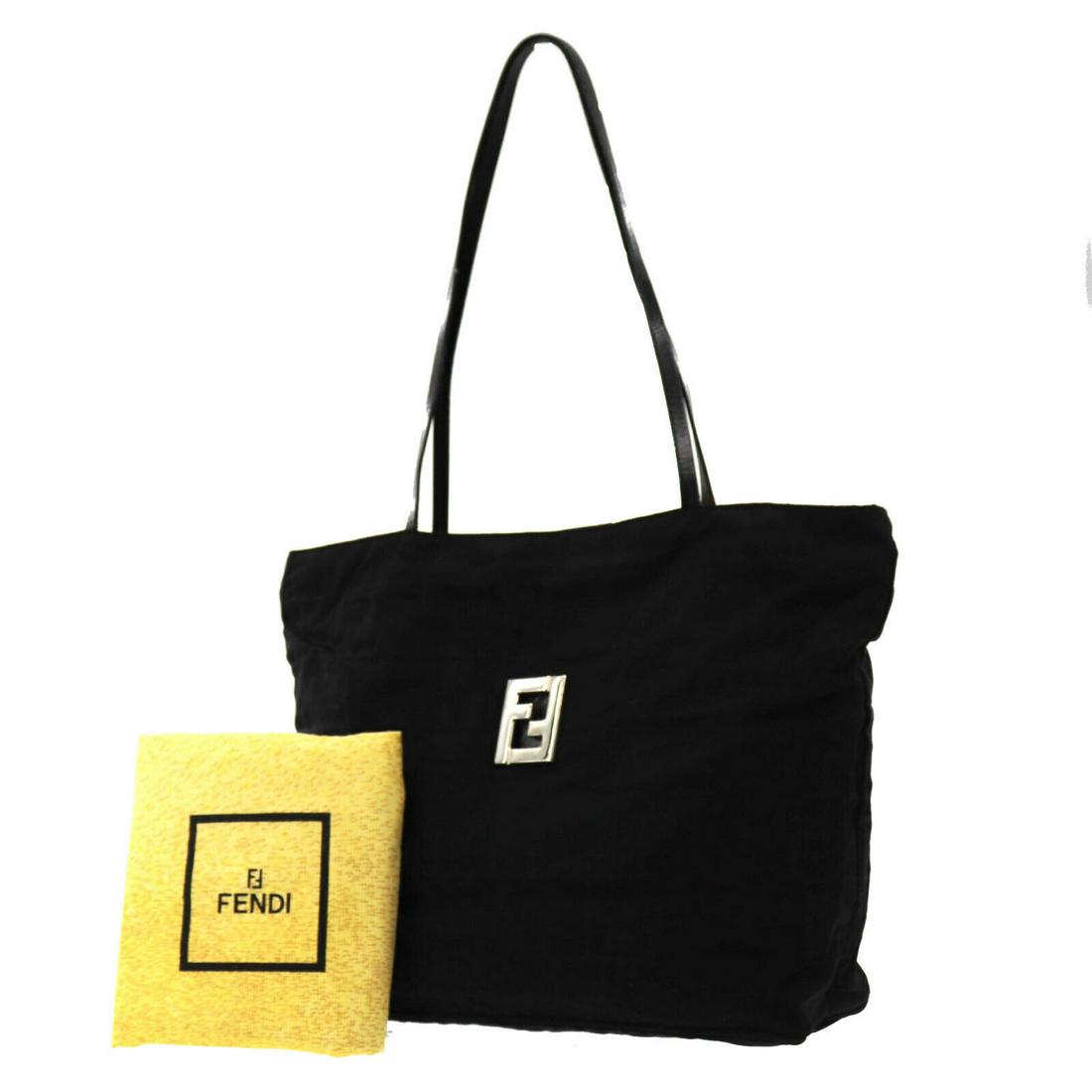 Authentic FENDI VINTAGE Nylon, Leather Shoulder Bag: Brand: FENDI Material: Nylon, Leather Style: Shoulder Bag Color: Black Size(Inch): H 11.8 x D 5.1 x L 12.9 Handle: 24.4 Country of Origin: Italy Come with: Dust Bag All Bidhaus items come with a 100% 