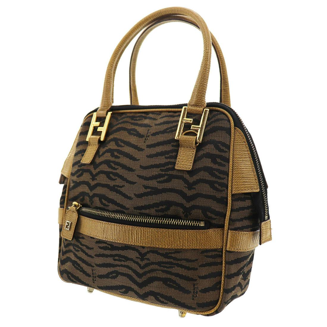 Authentic FENDI VINTAGE Canvas Nylon Leather Hand Bag: Brand: FENDI Material: Canvas Nylon Leather Style: Hand Bag Color: Brown Size(Inch): H 9.0 x D 3.5 x L 8.2 Handle: 16.1 Country of Origin: Italy Come with: - All Bidhaus items come with a 100% money-b