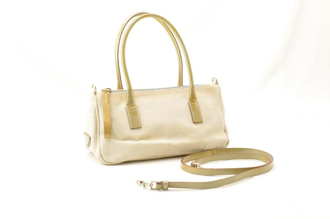 Authentic PRADA Canvas Hand Bag: Brand: PRADA Material: Canvas Style: Hand Bag Color: Beige Size(inch): W9.05 x H4.72 x D3.54inch/ Shoulder Length 35.43inch(Approx) Country of Origin: Italy Accessory: Dust Bag / Shoulder Strap All Bi