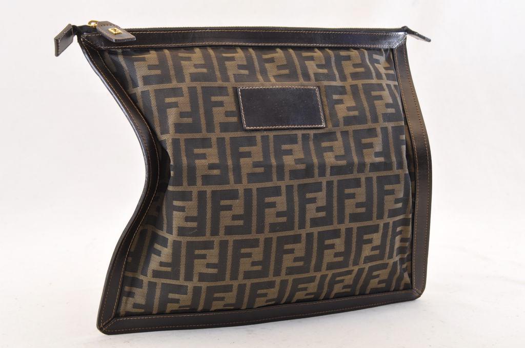 Authentic FENDI Canvas Pouch: Brand: FENDI Material: Canvas Style: Pouch Color: Brown Size(inch): W12.99 x H11.81 x D0.11inch(Approx) Country of Origin: Italy Accessory: There is no item box and dust bag. We will send only the ite