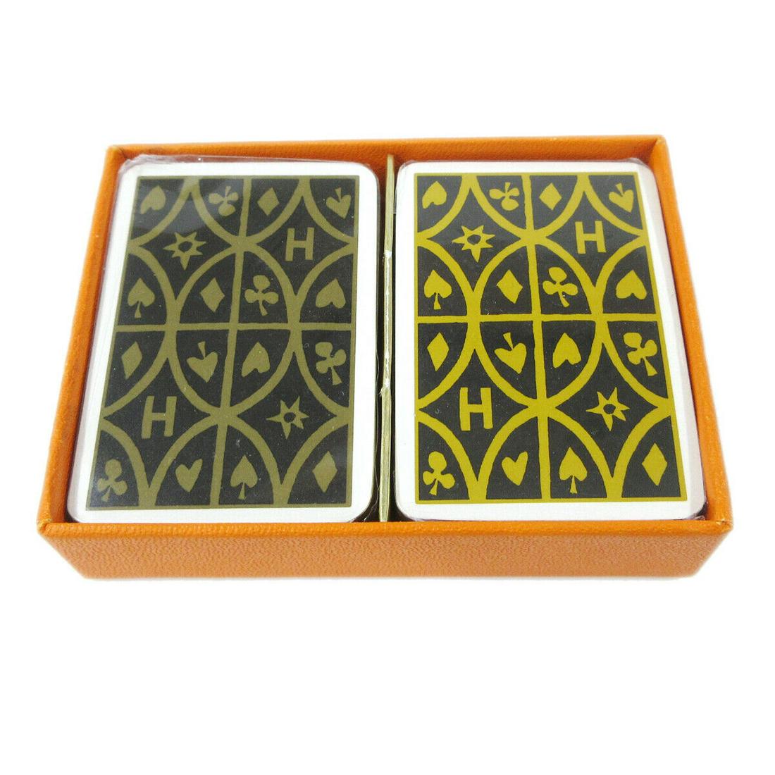 Authentic HERMES Trump Card Games: Brand: HERMES Material: - Color: White, Black etc Size(inch): W 1.6 " x H 2.4 " Country of Origin: France Come with: Box All Bidhaus items come with a 100% money-back authenticity guarantee. Please re