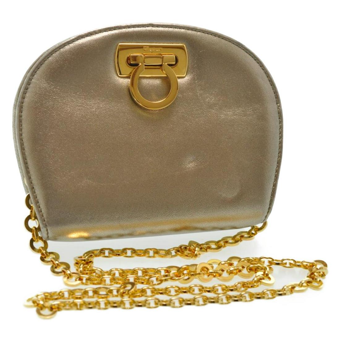Authentic FENDI / SALVATORE FERRAGAMO Leather Shoulder: Brand: FENDI / SALVATORE FERRAGAMO Material: Leather Style: Shoulder Bag Color: Gold Size(inch): W6.49 x H5.11 x D2.36inch / Shoulder Drop 18.9inch(Approx) Country of Origin: Italy Accessory: There is