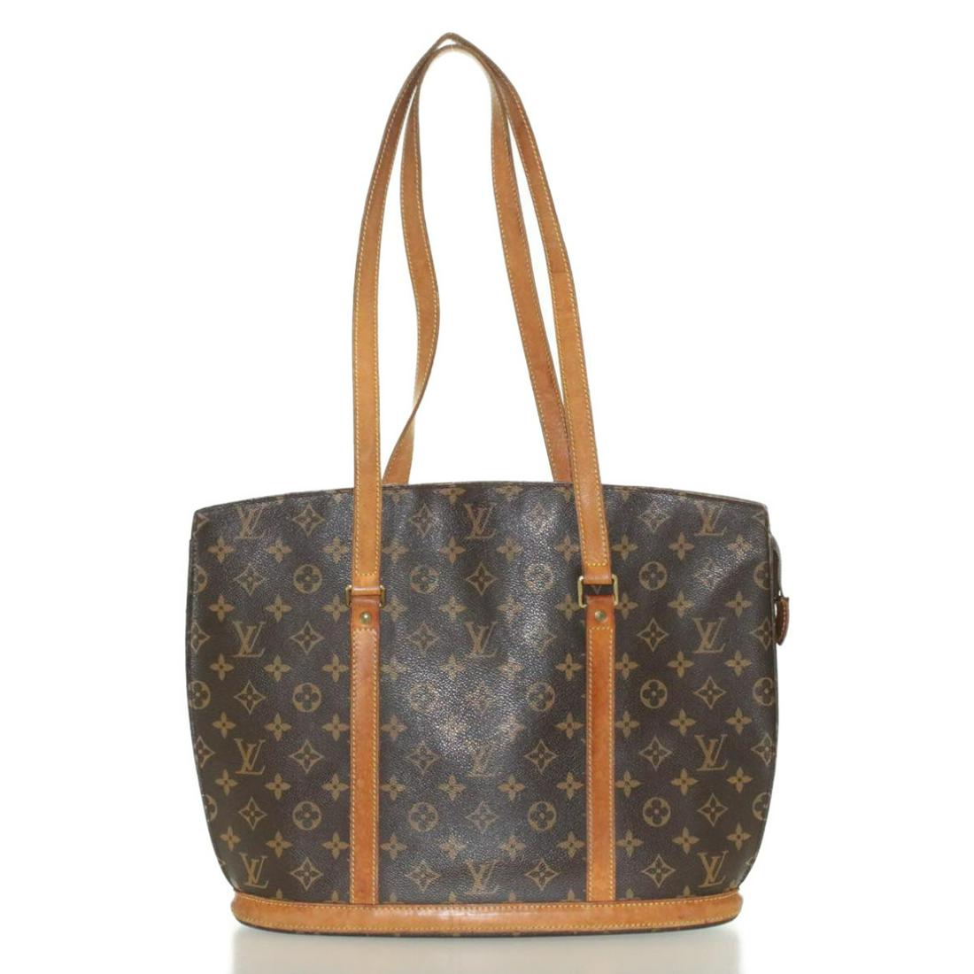 Authentic LOUIS VUITTON Monogram Babylone Tote Bag: Brand: LOUIS VUITTON Style: Tote Bag Material: Monogram Canvas Color: Monogram Made in: France Size (Inches): W15.7 x H11.8 x D4.3"(Approx) Exterior Condition: Monogram Canvas : loose shape, rubbing E