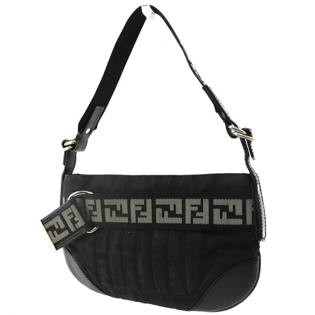 Authentic FENDI VINTAGE Nylon, Leather Hand Bag: Brand: FENDI Material: Nylon, Leather Style: Hand Bag Color: Black Size(Inch): H 5.9 x D 1.1 x L 10.0 Handle. 19.6 Country of Origin: Italy Come with: - All Bidhaus items come with a 100% money-back a