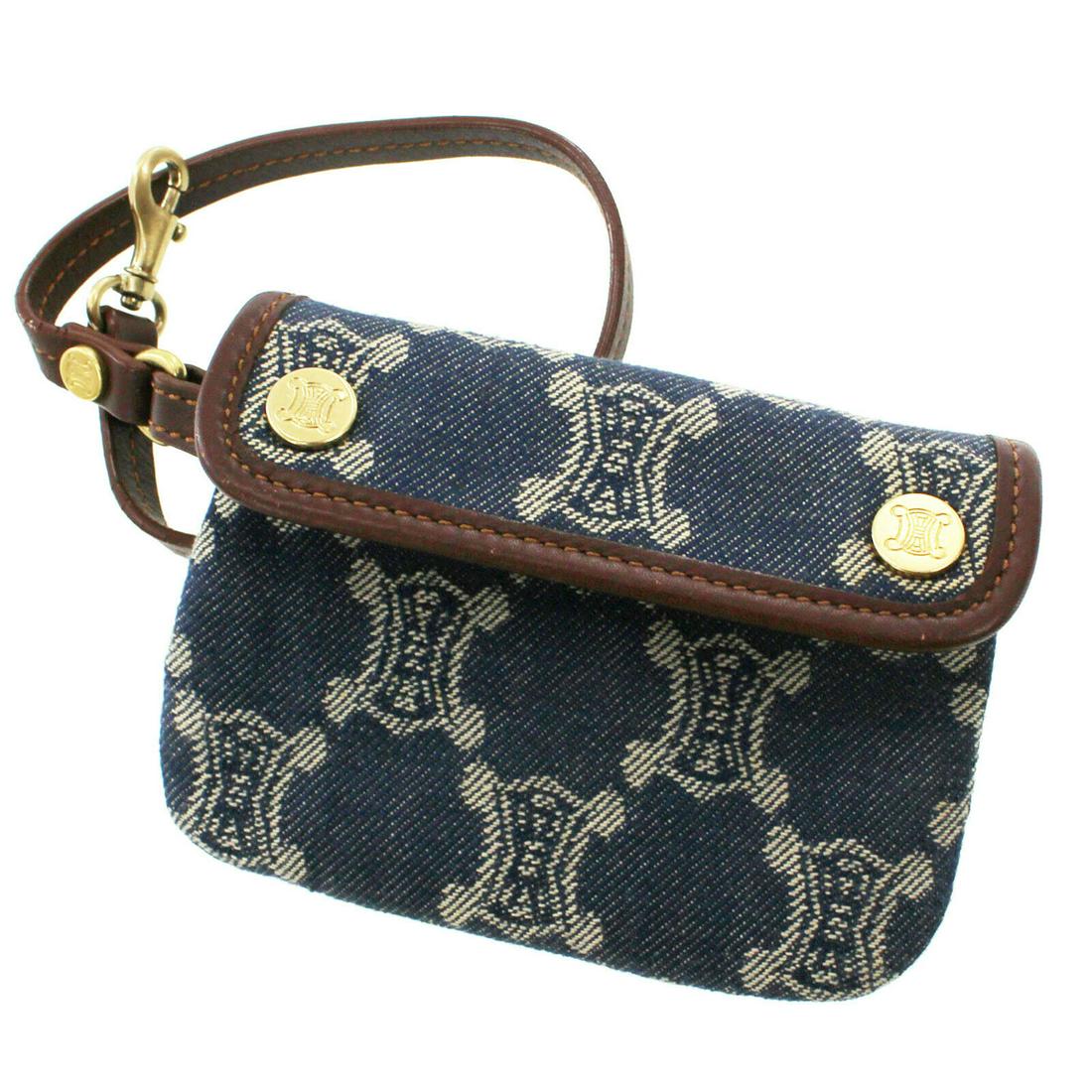 Authentic CELINE Denim Canvas Pouch: Brand: CELINE Material: Denim Canvas Style: Pouch Color: Denim Blue Size(Inch): H 3.5 x D 0.3 x L 4.9 Strap.13.3 Come with: - All Bidhaus items come with a 100% money-back authenticity guarantee. ALL