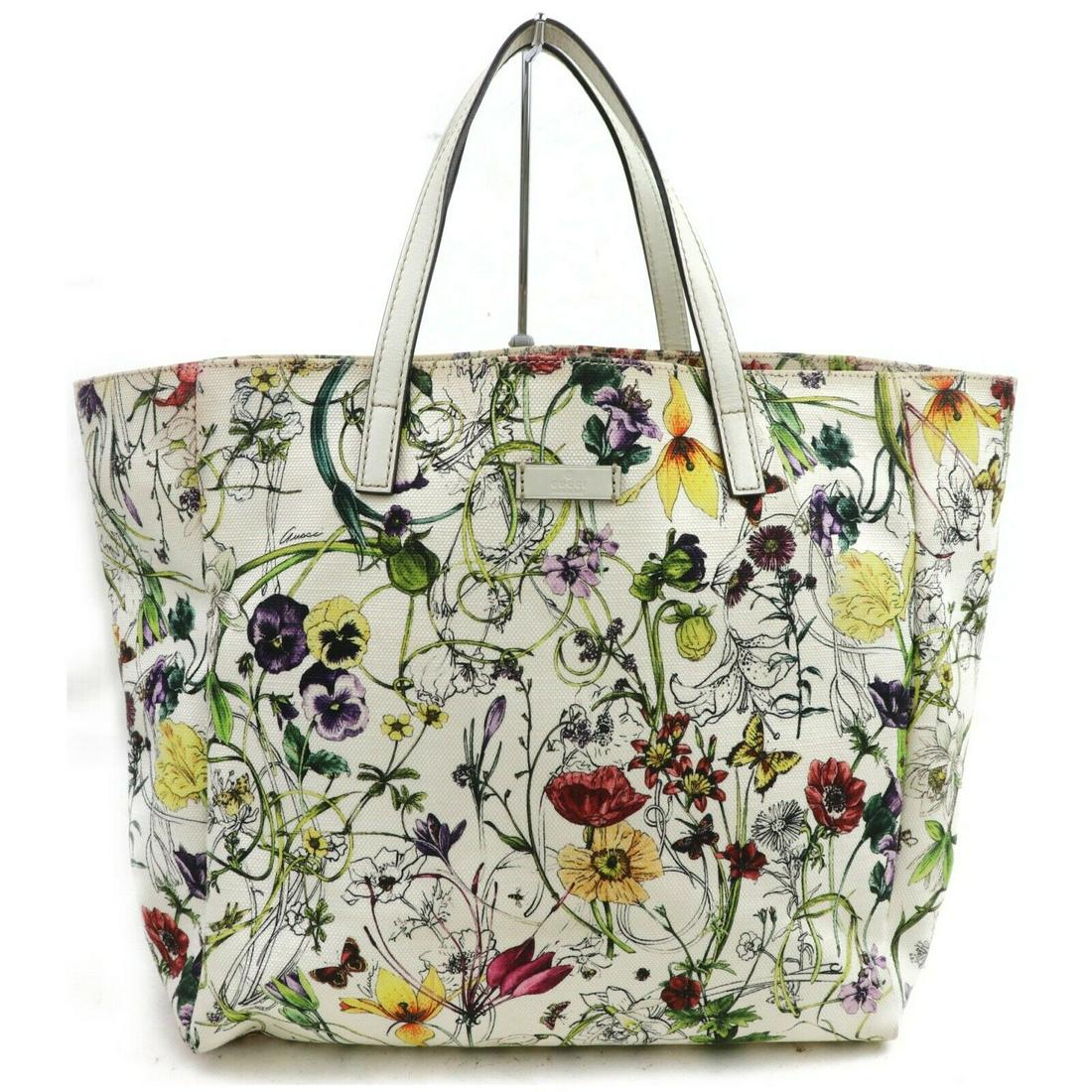 Authentic GUCCI Canvas Tote Bag: Brand: GUCCI Material: Canvas Style: Tote Bag Color: Whites Size(inch): W12.2 inch(approx) /31 cm(approx) x H11.4 inch(approx) /29 cm(approx) x D5.51 inch(approx) /14 cm(approx) " Country of Origin: I