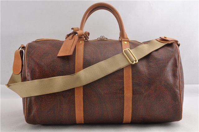 Authentic ETRO PVC Boston Bag: Brand: ETRO Material: PVC Style: Boston Bag Color: Brown Size(inch): W18.9 x H9.4 x D9.4" / Handle Drop 5.9"(Approx) Country of Origin: Italy Accessory: There is no ItemBox and DustBag.We will send on