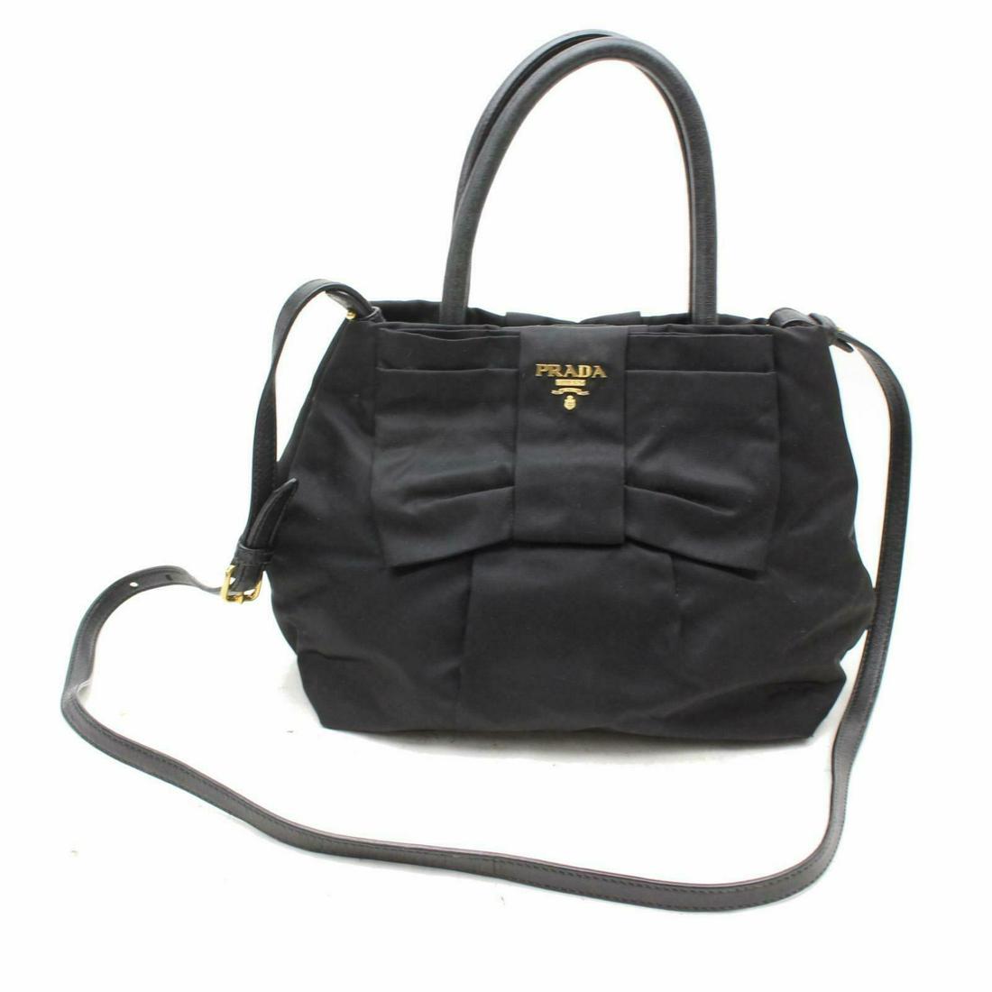 Authentic PRADA Nylon Hand Bag: Brand: PRADA Material: Nylon Style: Hand Bag Color: Black Size(inch): W8.26 inch(approx) /21 cm(approx) x H7.87 inch(approx) /20 cm(approx) x D5.11 inch(approx) /13 cm(approx) " / Strap Drop: Shoulder